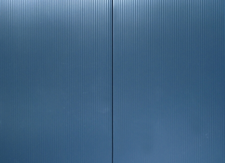 Surface of a structured panel facade of an industrial buildingの写真素材