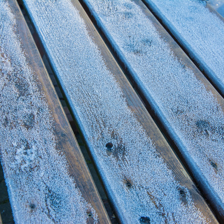 picture of frost and ice on a table - useable as background or textureの写真素材