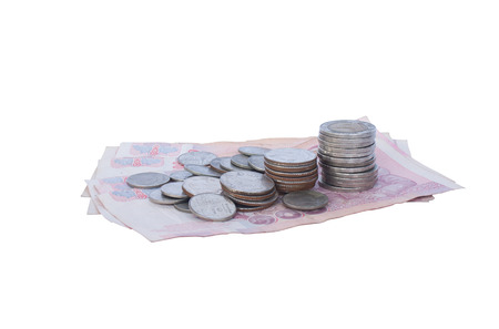 Thailand coins and banknotes Through the use of state Put together on a white background.の写真素材