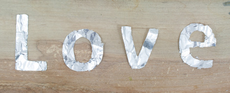 concept word "love" Silver wood floorsの写真素材