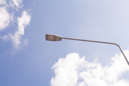 Street light pole, the view from the bottom up. Sky backdrop
