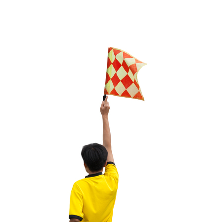 The back of the linesman flags to signal. Isolated white background