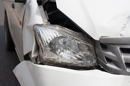 The front of the car damaged in an accident. Automobile Whiteの写真素材