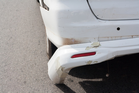 White rear car damage, car accident on the road.の写真素材