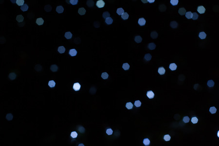 Abstract background of out of focus lights at night. Light hexagon.の写真素材