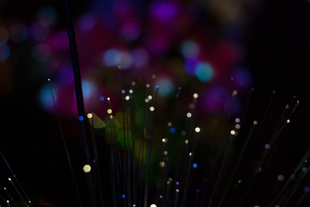 Abstract background of out of focus lights at night. Light hexagon. Blue lights in the dark.の写真素材