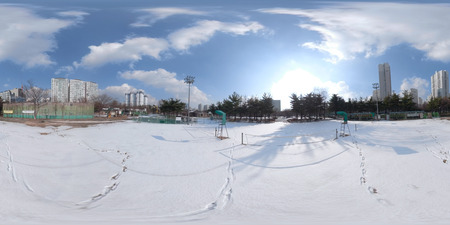 BUCHEON, SOUTH KOREA - December 13, 2018:  Panorama 360 degrees angle view of snow-covered park on a sunny day.のeditorial素材