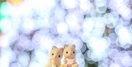 Cartoon cat with christmas tree lights background