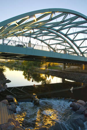 The Speer Boulevard Bridge in Denver, Colorado that suspends over the Platte River.の写真素材