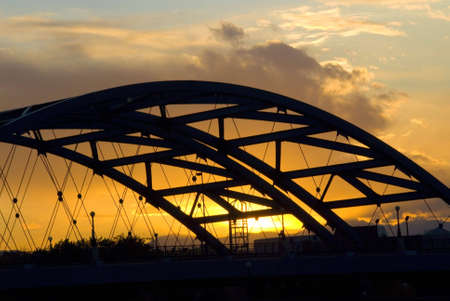 The Speer Boulevard Bridge in Denver, Colorado that suspends over the Platte River.の写真素材