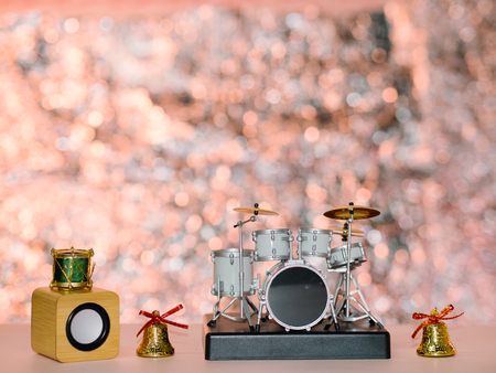 Christmas bell with drums shiny backgroundの写真素材