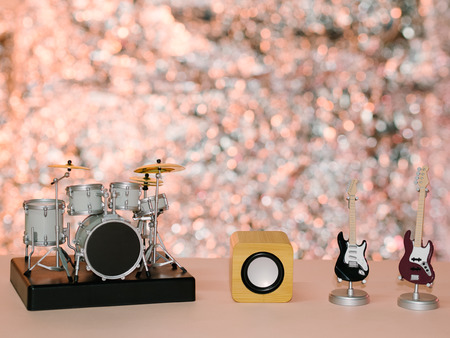 Guitar bass drums and other instruments and shiny backgroundの写真素材