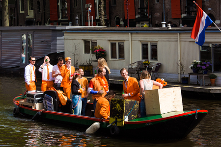 Amsterdam, Netherlands - April, 2018: People on the boat celebrate Kings day in Amsterdam city, Netherlandsのeditorial素材