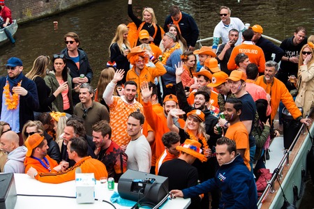 Amsterdam, Netherlands - April, 2018: People on the boat celebrate Kings day in Amsterdam city, Netherlandsのeditorial素材