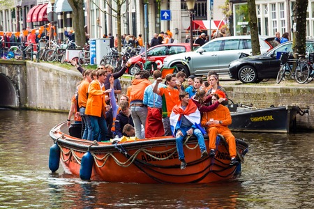 Amsterdam, Netherlands - April, 2018: People on the boat celebrate Kings day in Amsterdam city, Netherlandsのeditorial素材