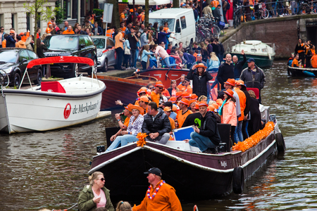 Amsterdam, Netherlands - April, 2018: People on the boat celebrate Kings day in Amsterdam city, Netherlandsのeditorial素材