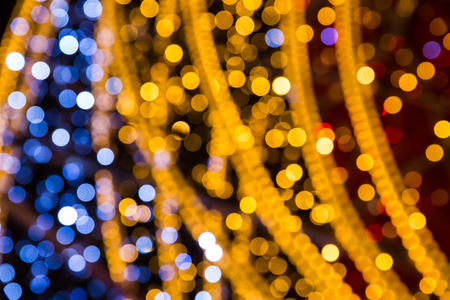 Christmas background with colorful bokeh light effectsの写真素材