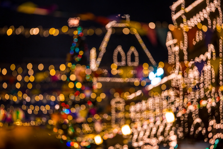 Abstract background with blurred christmas fair in Moscow cityの写真素材
