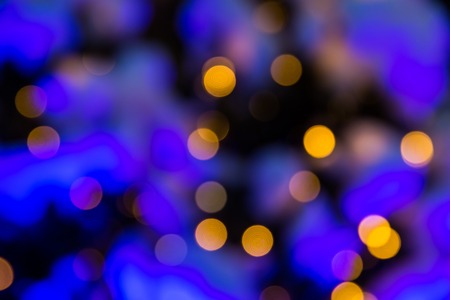 Abstract christmas background with colorful bokeh light effectsの写真素材