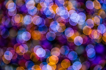 Christmas background with colorful bokeh light effectsの写真素材