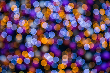 Christmas background with colorful bokeh light effectsの写真素材