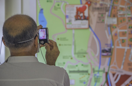 Tourist take a map picture for guide