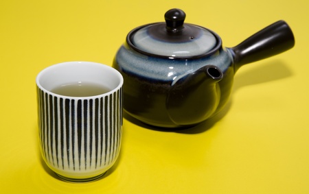 hot tea on yellow backgroundsの写真素材