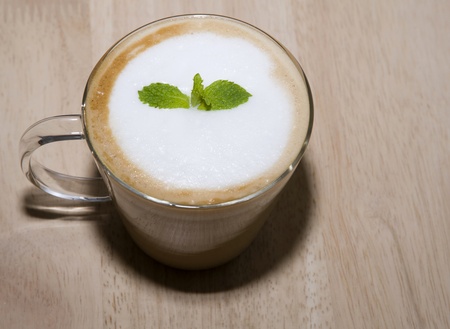 coffee and mint on wood backgroundsの写真素材