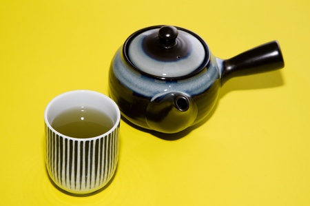 tea hot on yellow backgroundsの写真素材