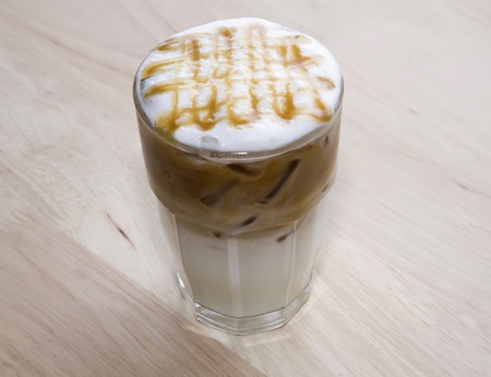 coffee milk on wood backgroundsの写真素材