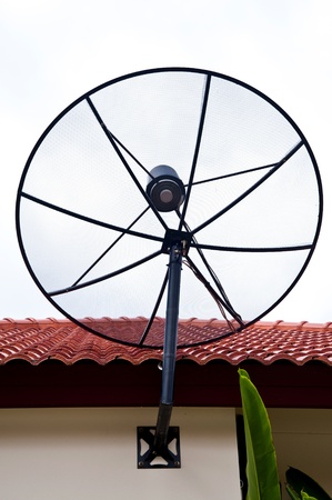 satellite dish on house roofのeditorial素材
