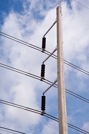 electricity post and nice blue skyの写真素材