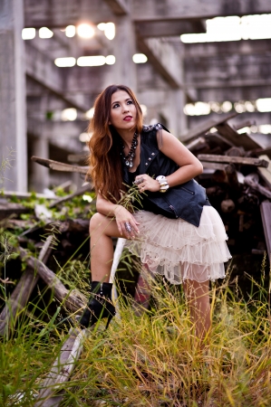 teen girl rock in construction siteの写真素材