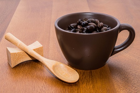 Coffee beans in cupの写真素材