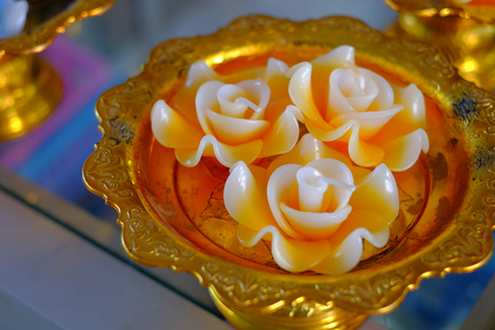 An candle in thai templeの写真素材
