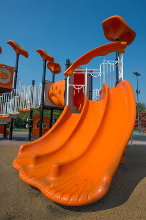 Playgrounds in garden and nice blue skyの写真素材