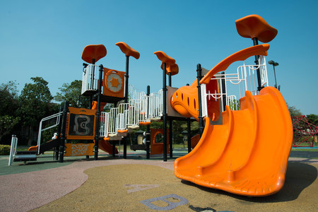 Playgrounds in garden and nice blue skyの写真素材