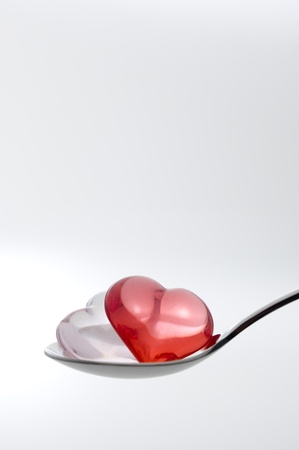 Scoop the Small heart shape sundries with a spoonの写真素材