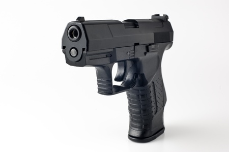 Close Up of pistol on white backgroundの写真素材