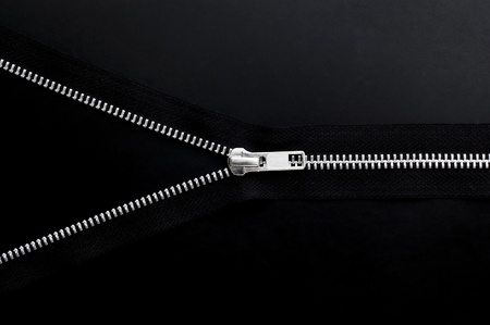 Zipper on black background.の写真素材
