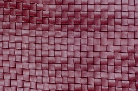 Dark red leather texture closeup.の写真素材