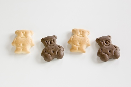 Biscuits in the form of a bear on a white backgroundの写真素材