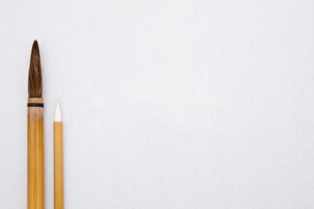 Writing brush for calligraphy on white paper の写真素材