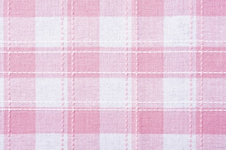 Pink plaid kitchen mat for background image, close up の写真素材