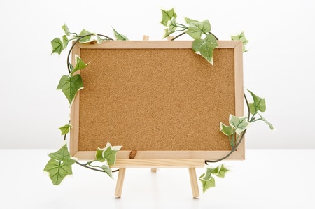 Blank cork message board with wooden easel 