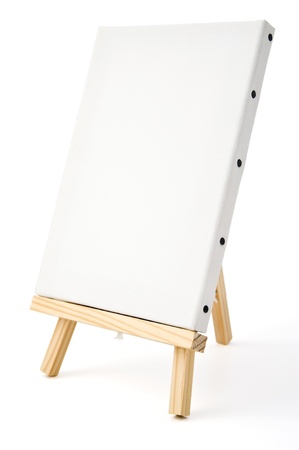 blank white canvas of painting tools on wooden easel の写真素材