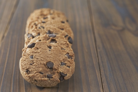 Chocolate Chip Cookies on wooden table の写真素材