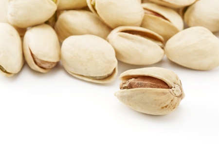 Close-up image of pistachios with white backgroundの写真素材