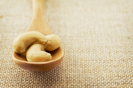 Spoonful of cashew nuts の写真素材