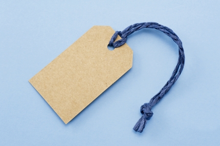 Blank tag on blue backgroundの写真素材
